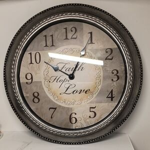 Elegant Silver Wall Clock with Inspirational Design